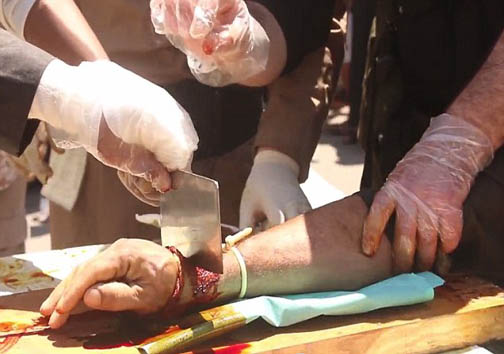 قطع دست و پا با ساطور داعشی+عکس