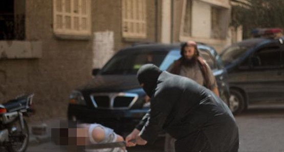 قربانی بدون سر داعش به صلیب کشیده شد (تصاویر+16)