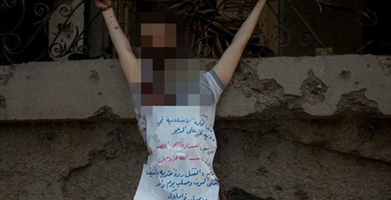 قربانی بدون سر داعش به صلیب کشیده شد (تصاویر+16)
