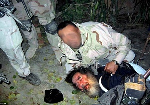 تصویر لحظه دستگیری صدام در بین مهم ترین تصاویر تاریخ ساز جهان