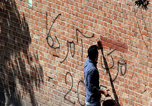 شعار مرگ بر آمریکا از دیوارها پاک می شود!+ عکس