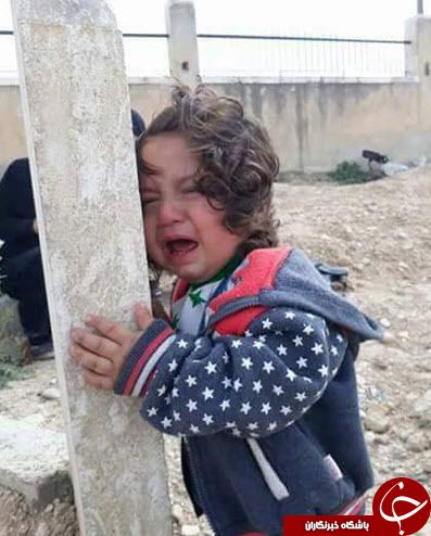گریه سوزناک دختربچه سوری بر سر مزار پدرش + عکس
