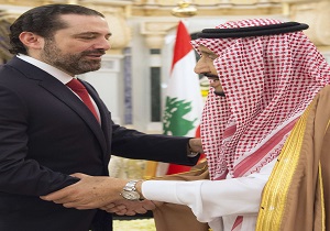 صور.. العاهل السعودى يستقبل رئيس وزراء لبنان فى مكتبه بالرياض