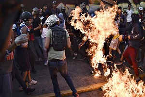 Protesters stage violent rally in Venezuela