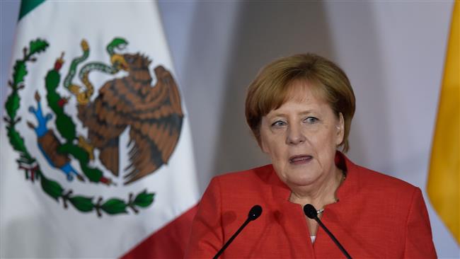 Merkel says walls won’t end immigration issues