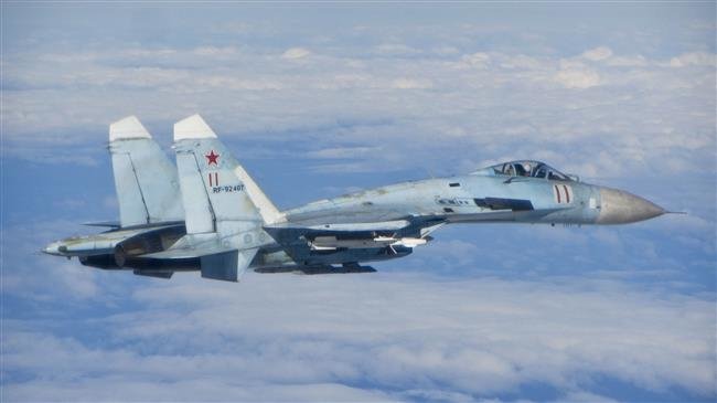 Russia says spotted 21 spy jets past week