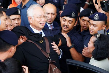 Malaysia reopens submarine probe, questions former PM Najib