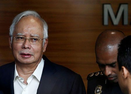 Malaysia's Najib explains why he had so many luxury handbags, lots of cash, jewelry