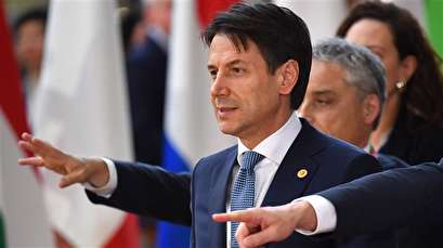 Italy PM threatens to block EU statement on refugees