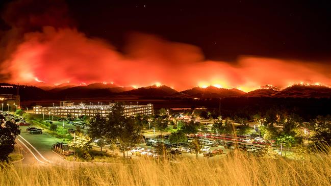Fast-spreading California blaze, one of dozens, prompts evacuations