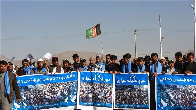 Afghans march in cities to call for pullout of US troops