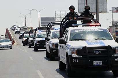 Across Mexico border from safe El Paso, violence surges in Juárez