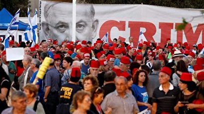 In Tel Aviv, tens of thousands protest immunity for Netanyahu