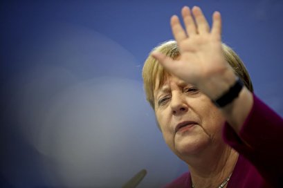 Merkel dismisses report she's given up on new party leader