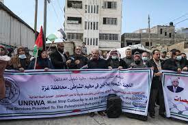 Palestinian refugees protest against UNRWA reductions of food coupons