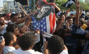 به آتش کشیده شدن پرچم های "آمریکا،اسرائیل،قطر وترکیه" در استان الغربیه مصر