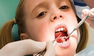 از چه زمانی کودک را به "دندانپزشکي" ببریم؟