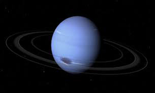 ویجر ۲ بر فراز بزرگترین قمر نپتون + عکس