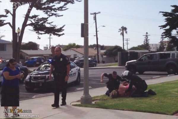 ضرب‌وشتم ‌بی‌رحمانه یک مادر آمریکایی توسط پلیس + عکس