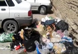 انباشت زباله در معابر فلاورجان + فیلم