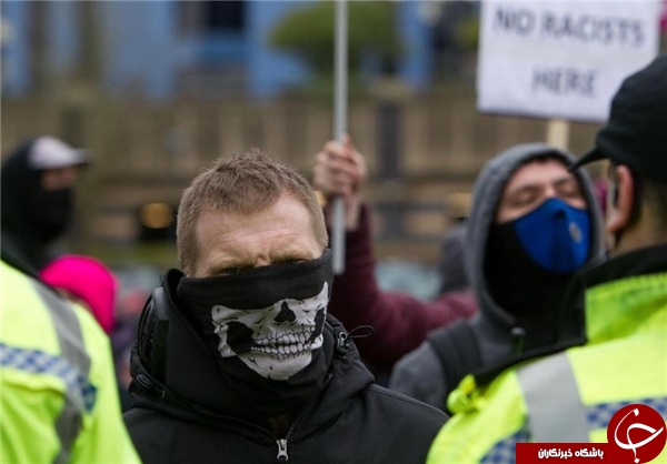 درگیری راست‌گرایان افراطی و مخالفان فاشیسم در انگلیس و مداخله پلیس+عکس