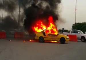 لحظه آتش‌سوزی تاکسی در فرودگاه اهواز + فیلم