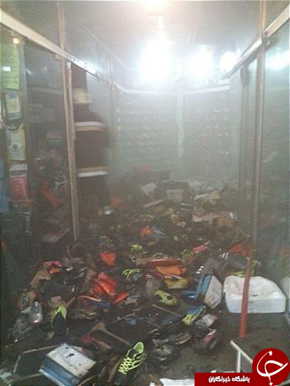 آتش سوزی فروشگاه لوازم ورزشی در میدان منیریه+تصاویر