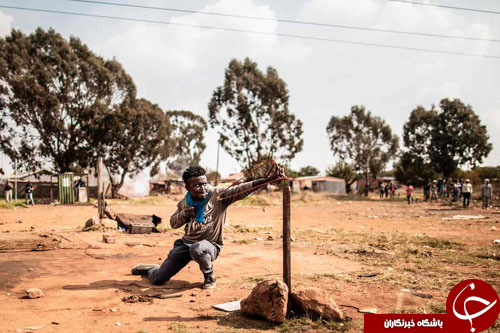 تصاویر روز: از زمین خوردن پوتین تا سیگار کشیدن با بامبو