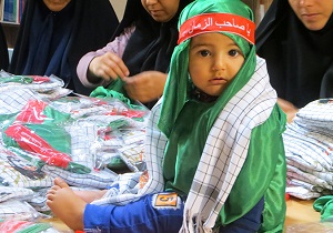 آماده سازی لباس متبرک حضرت علی اصغر(ع) دریزد