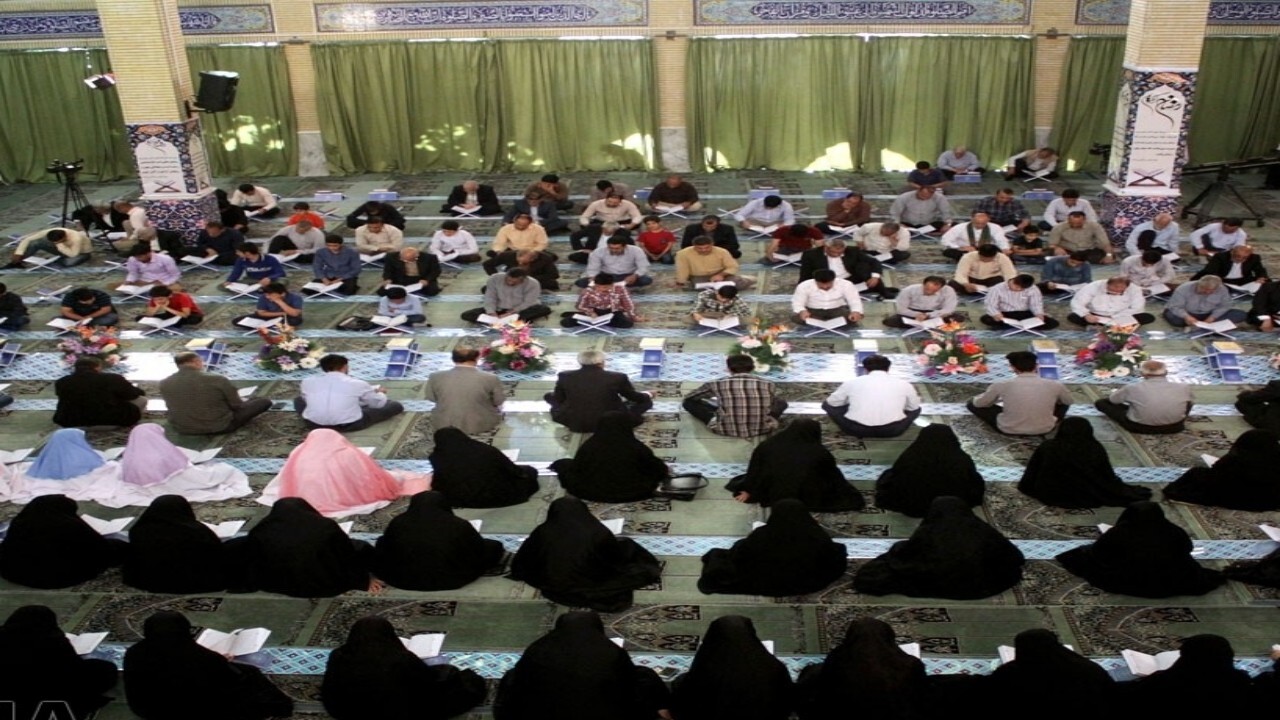 مراسم ترتیل خوانی قرآن اتباع افغانستانی در مشهد + فیلم
