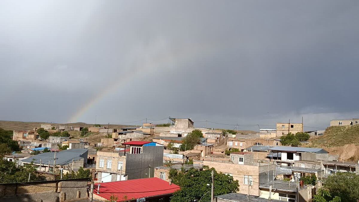 باشگاه خبرنگاران -رخ نمایی رنگین کمان در آسمان روستای گردشگری توآباد + فیلم و عکس